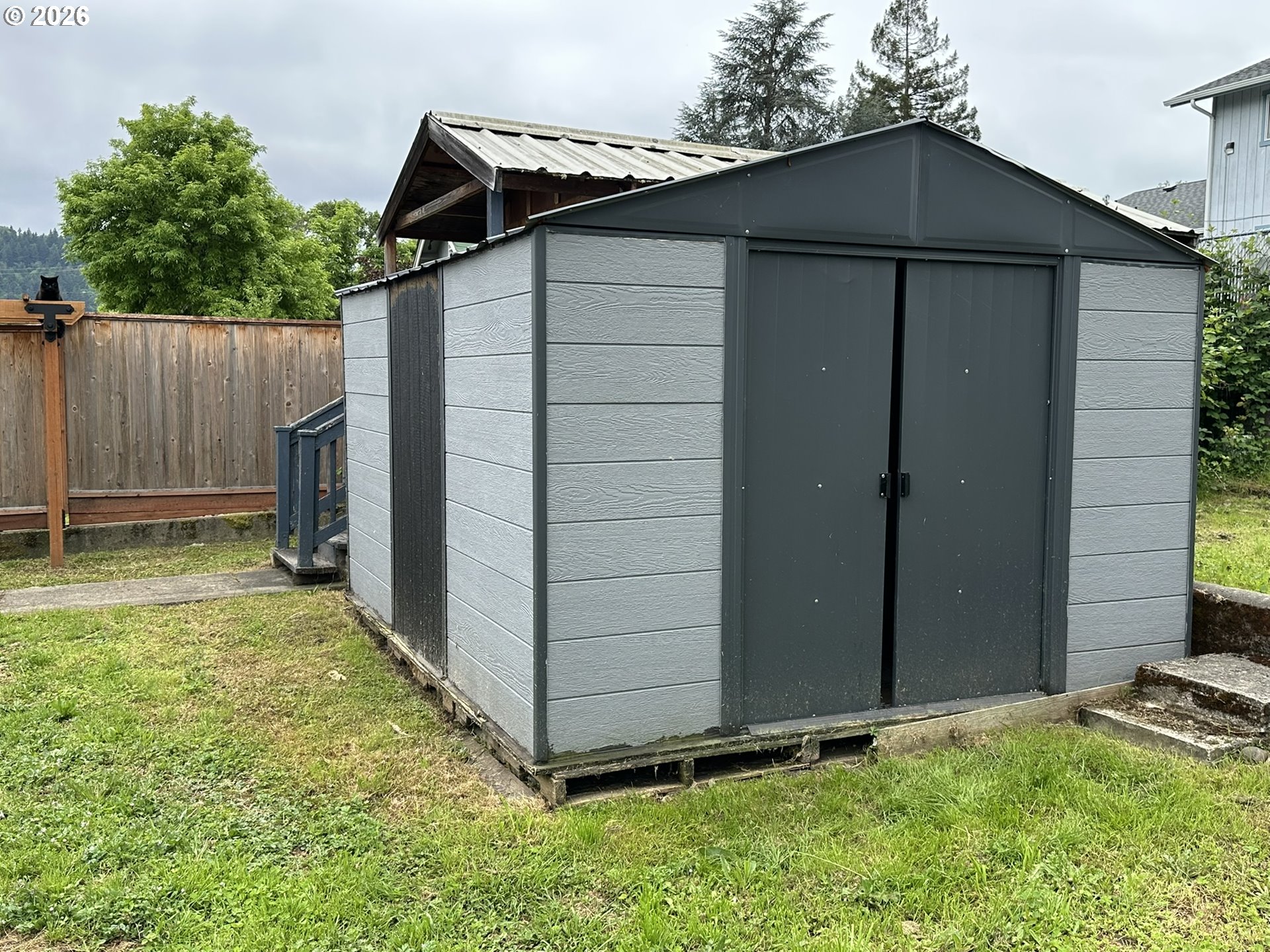 101 Southwest Peach Lane Winston, OR 97496 - Photo 21 of 22 a backyard of a house