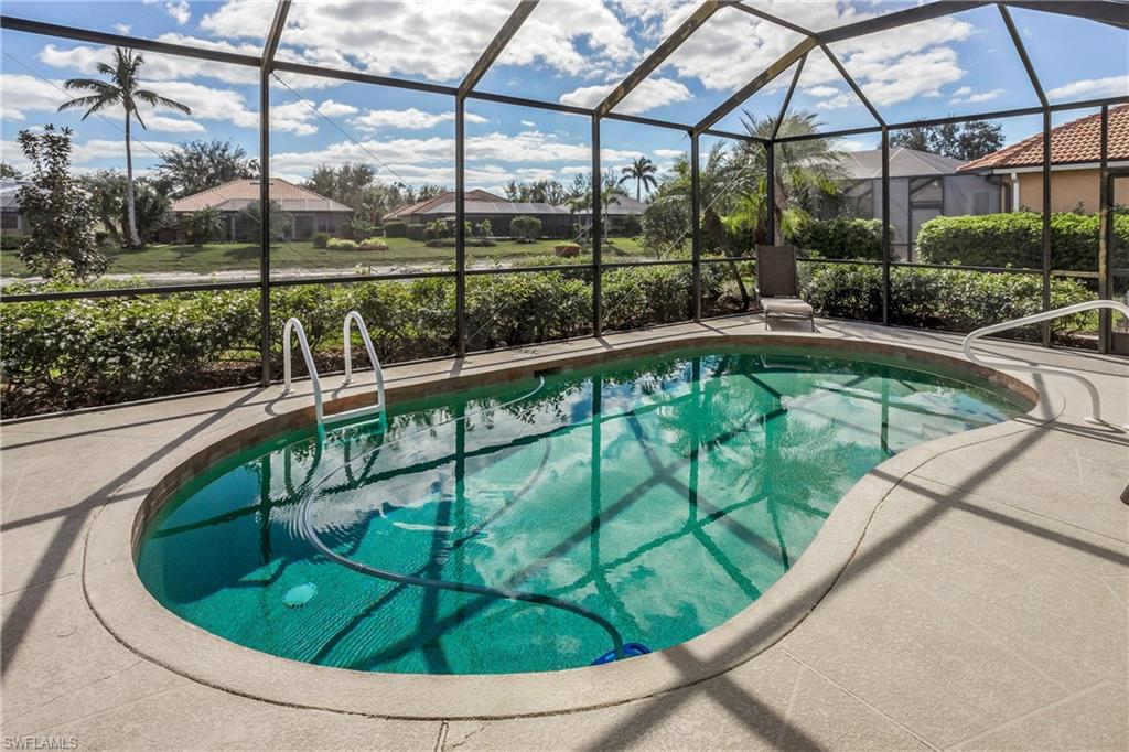9971 Rookery Circle Estero, FL 33928 - Photo 1 of 36 Solar heated pool with southern exposure