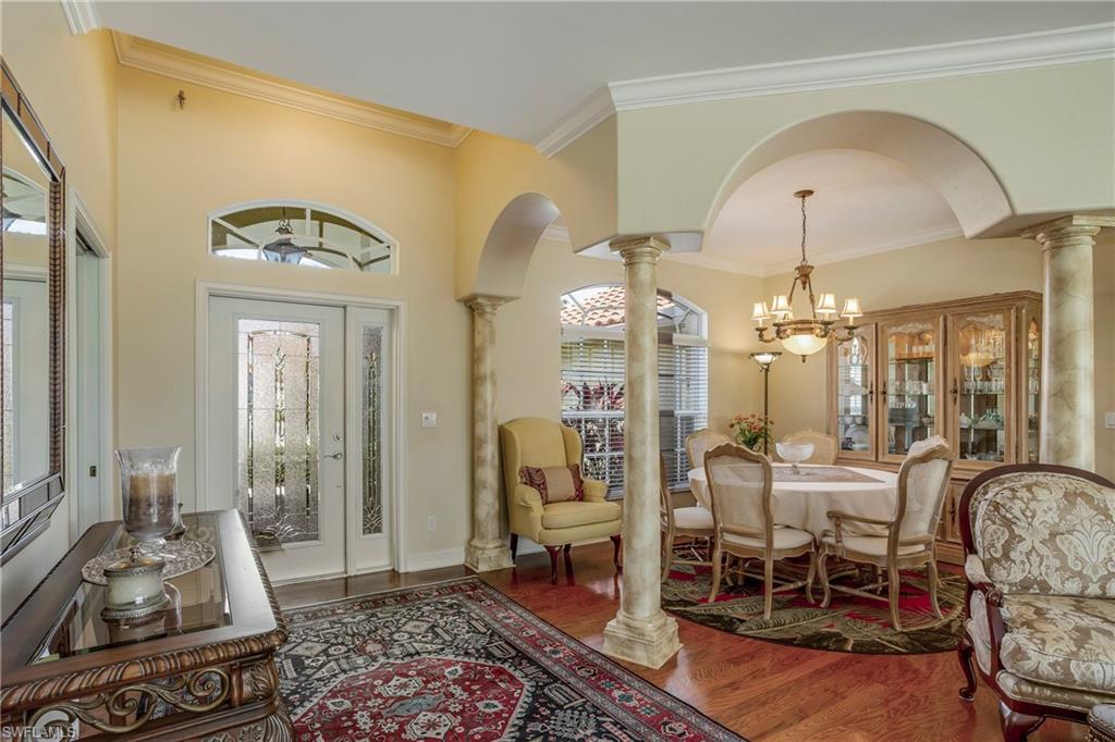 9971 Rookery Circle Estero, FL 33928 - Photo 12 of 36 Front entry and Dining Room