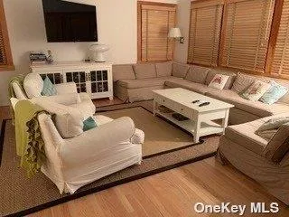 a dining hall with granite countertop a refrigerator dining table and chairs