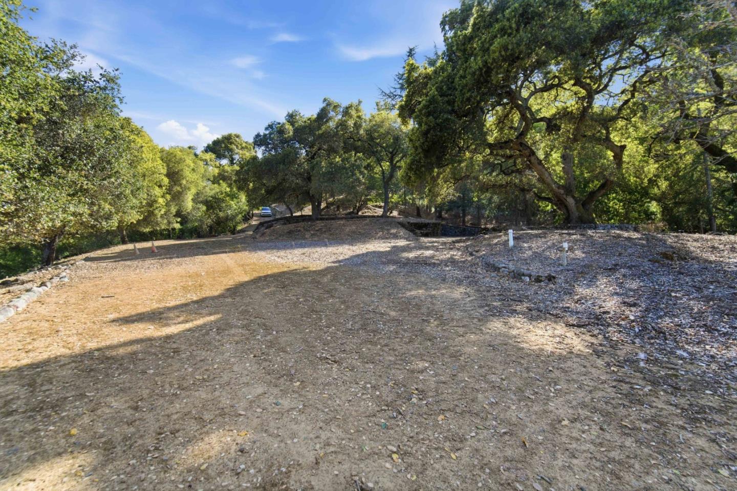 15400 Madrone Hill Road Saratoga, CA 95070 - Photo 15 of 32 a view of a yard with a tree