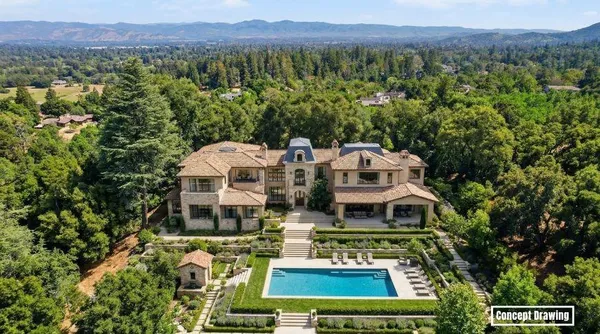 an aerial view of a house with a garden