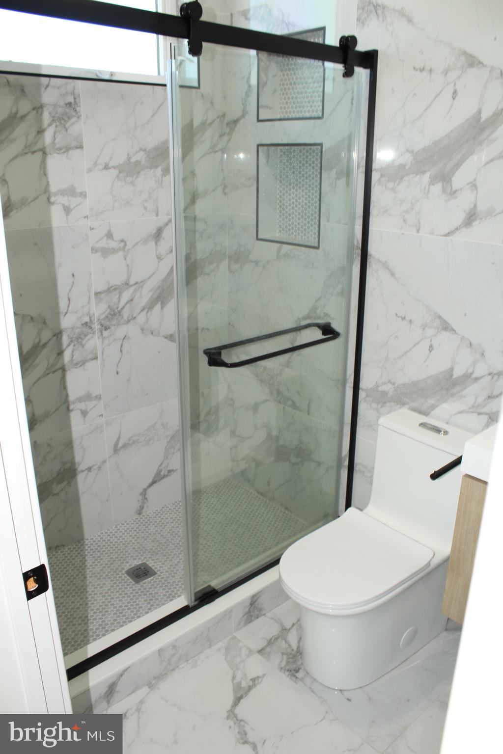 3017 Ridge Avenue, Unit B Philadelphia, PA 19121 - Photo 21 of 29 Sleek marble bathroom oasis.