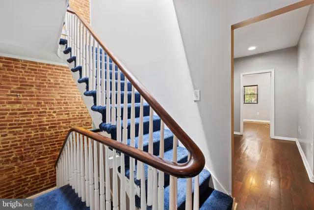 a view of entryway with wooden floor