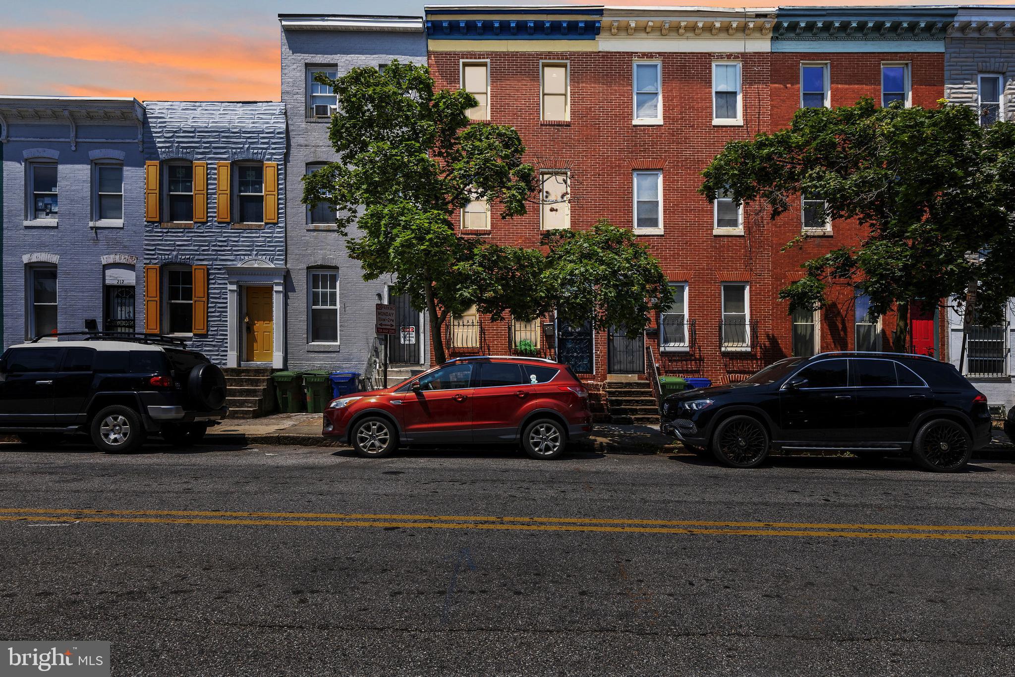 206 South Gilmor Street Baltimore, MD 21223 - Photo 25 of 27 a view of a car parked in front of a building