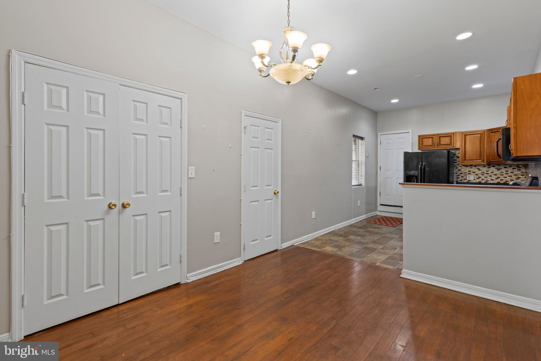 206 South Gilmor Street Baltimore, MD 21223 - Photo 6 of 27 a view of a kitchen with a sink and dishwasher cabinet