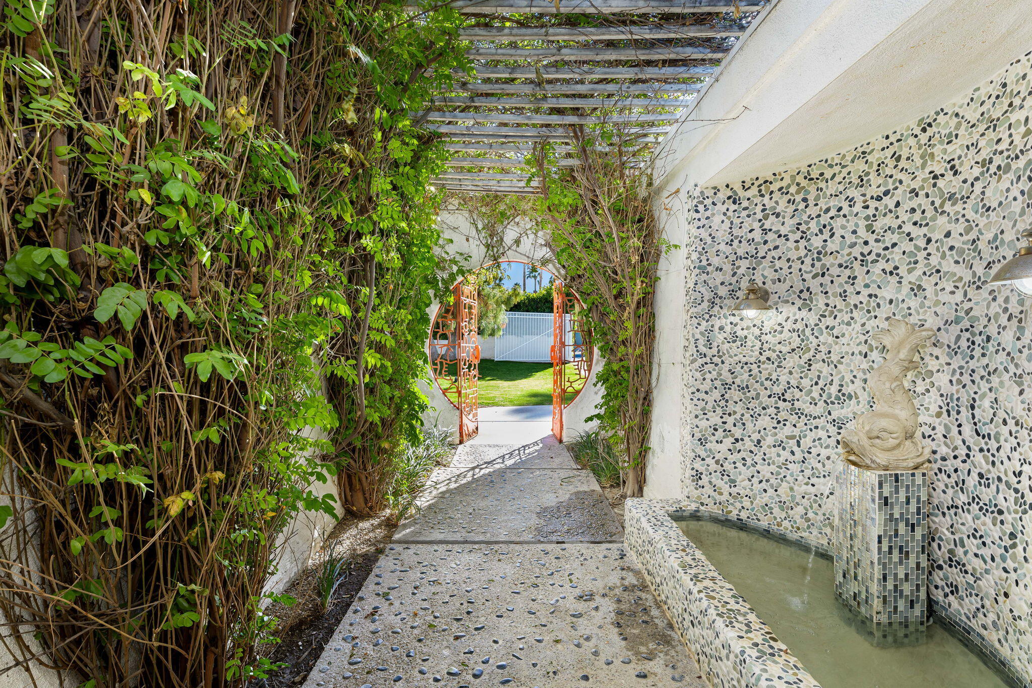 72890 Homestead Road Palm Desert, CA 92260 - Photo 11 of 45 a view of a pathway of a yard