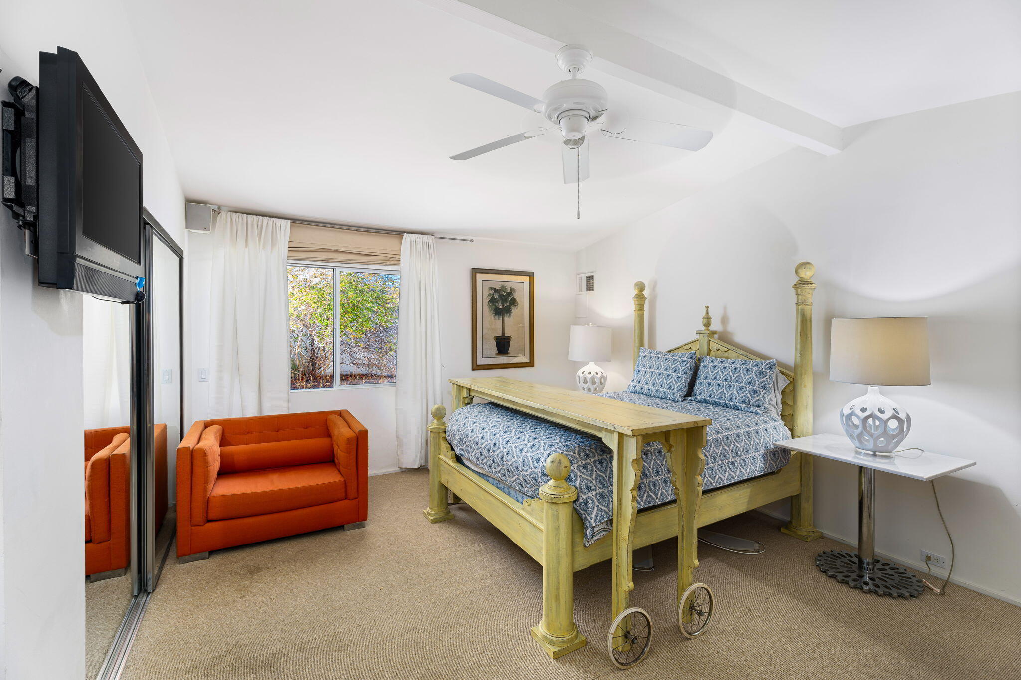 72890 Homestead Road Palm Desert, CA 92260 - Photo 33 of 45 a bed room with a bed and a couch