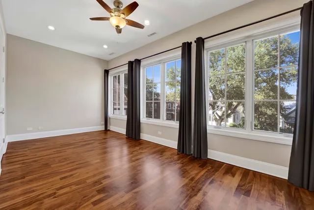 a view of a terrace with wooden floor and seating space
