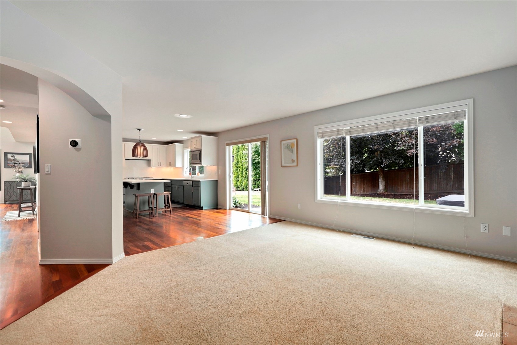 4415 240 Place Southeast Bothell, WA 98021 - Photo 19 of 40 a view of a living room with furniture and windows