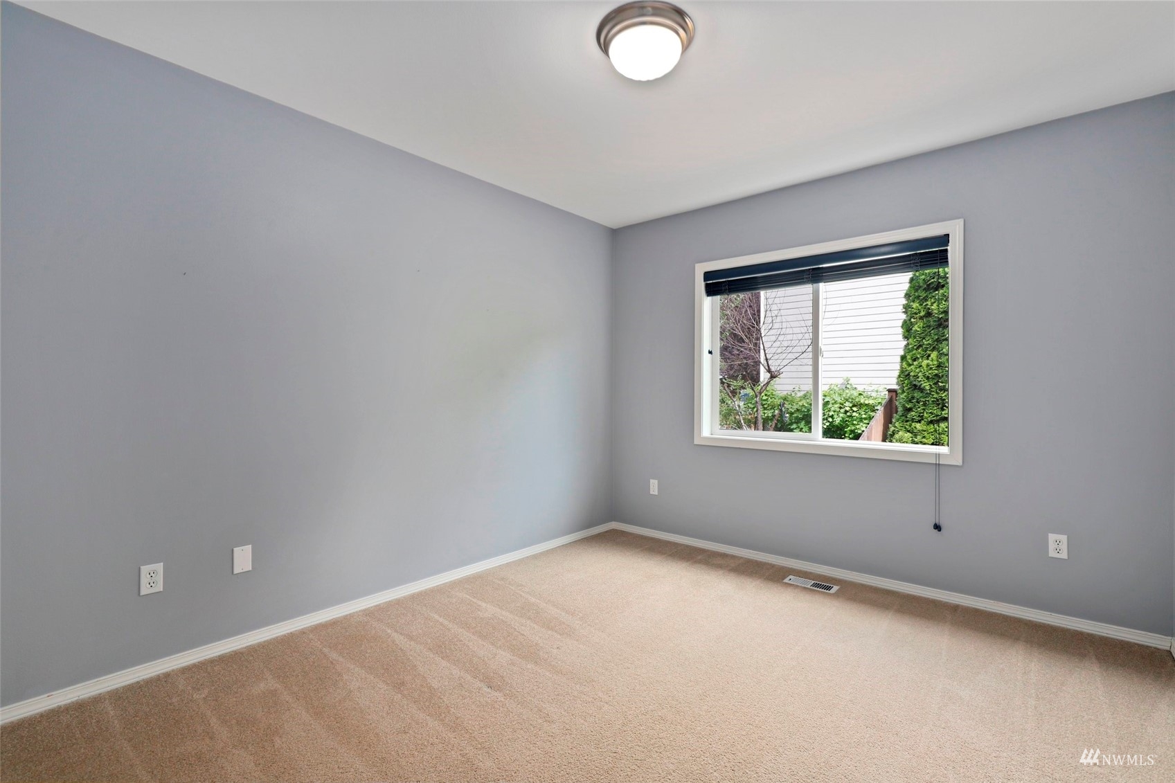 4415 240 Place Southeast Bothell, WA 98021 - Photo 30 of 40 an empty room with a window
