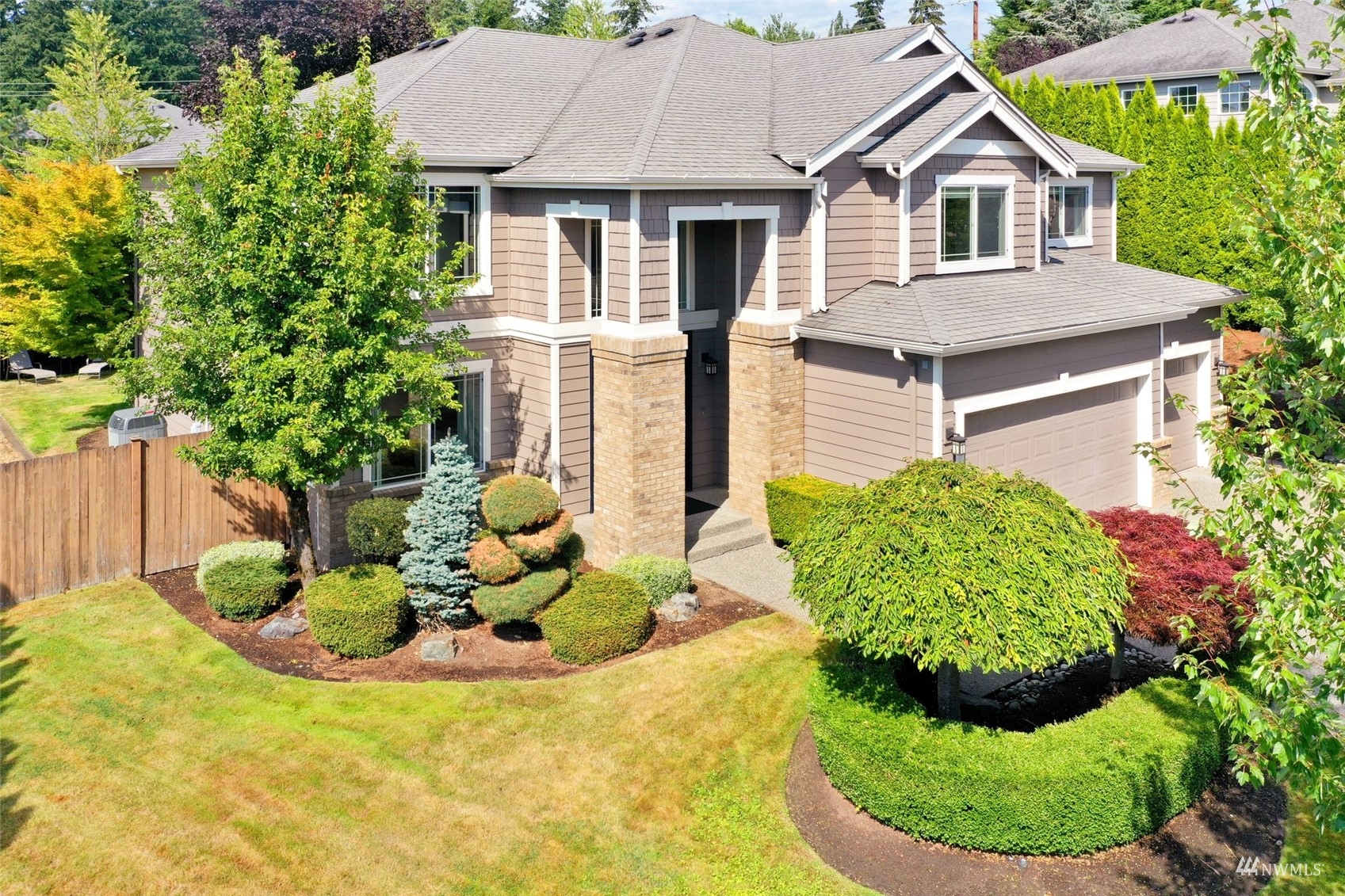 4415 240 Place Southeast Bothell, WA 98021 - Photo 4 of 40 a aerial view of a house with yard