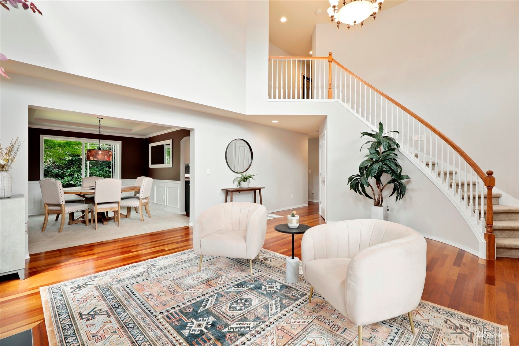 4415 240 Place Southeast Bothell, WA 98021 - Photo 10 of 40 a living room with furniture and a table
