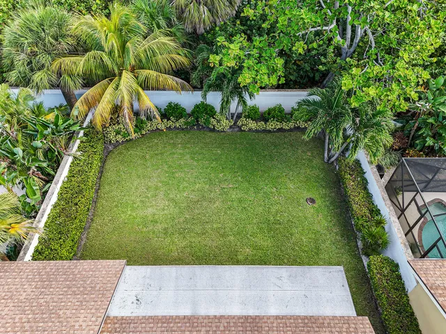 a view of a garden with a bench