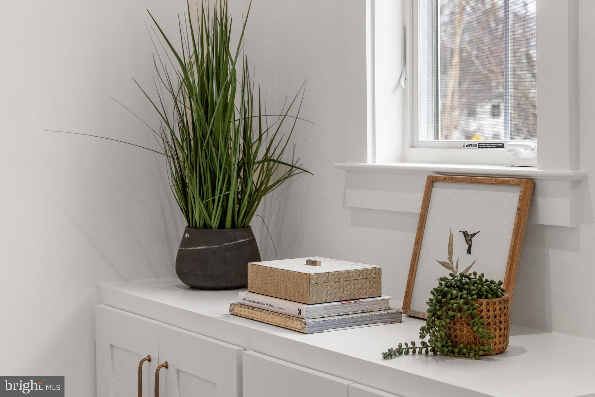7804 Custer Road Bethesda, MD 20814 - Photo 19 of 68 a vase of flowers sitting on a table