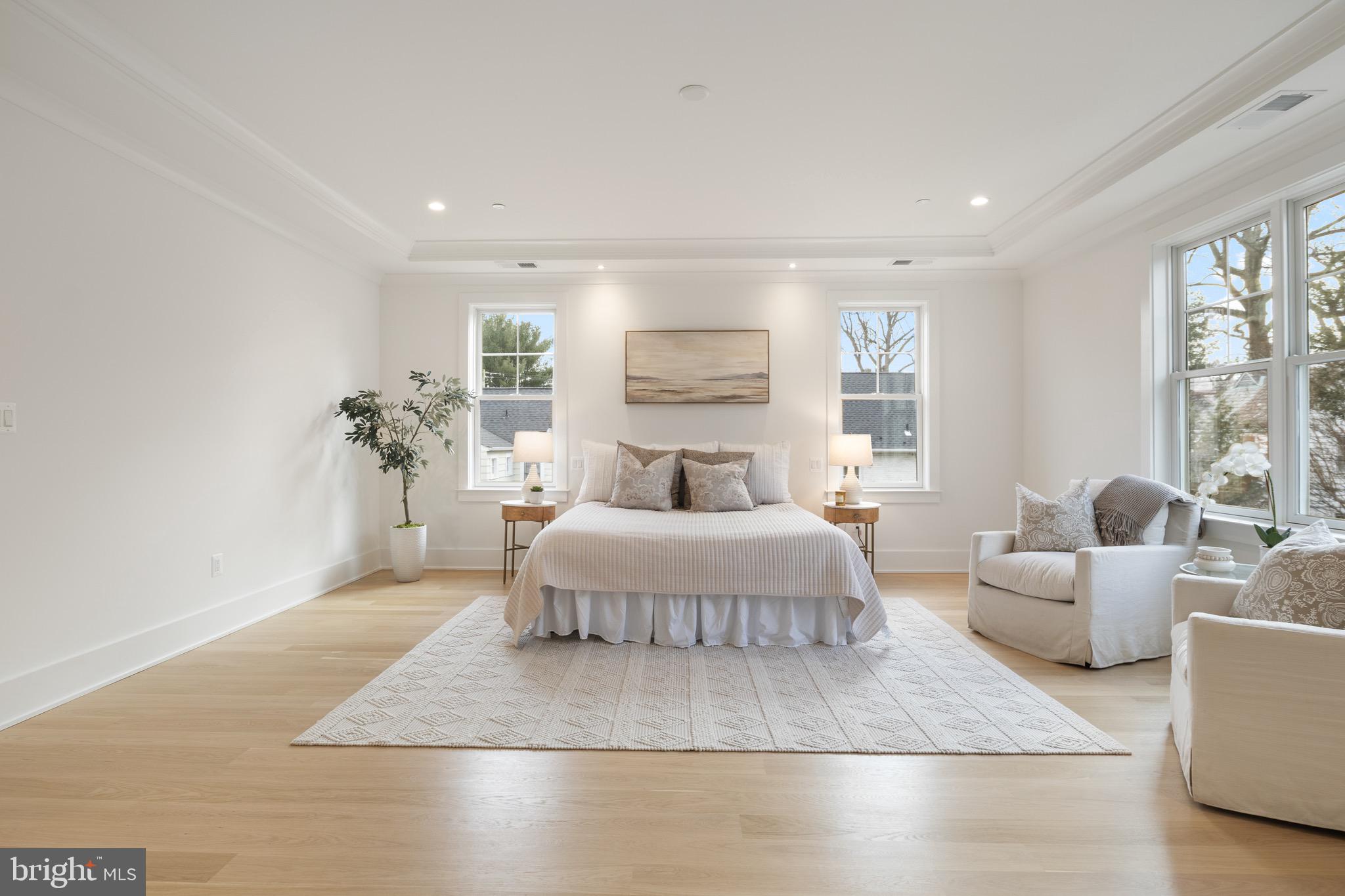 7804 Custer Road Bethesda, MD 20814 - Photo 36 of 68 a bedroom with a large bed and a couch