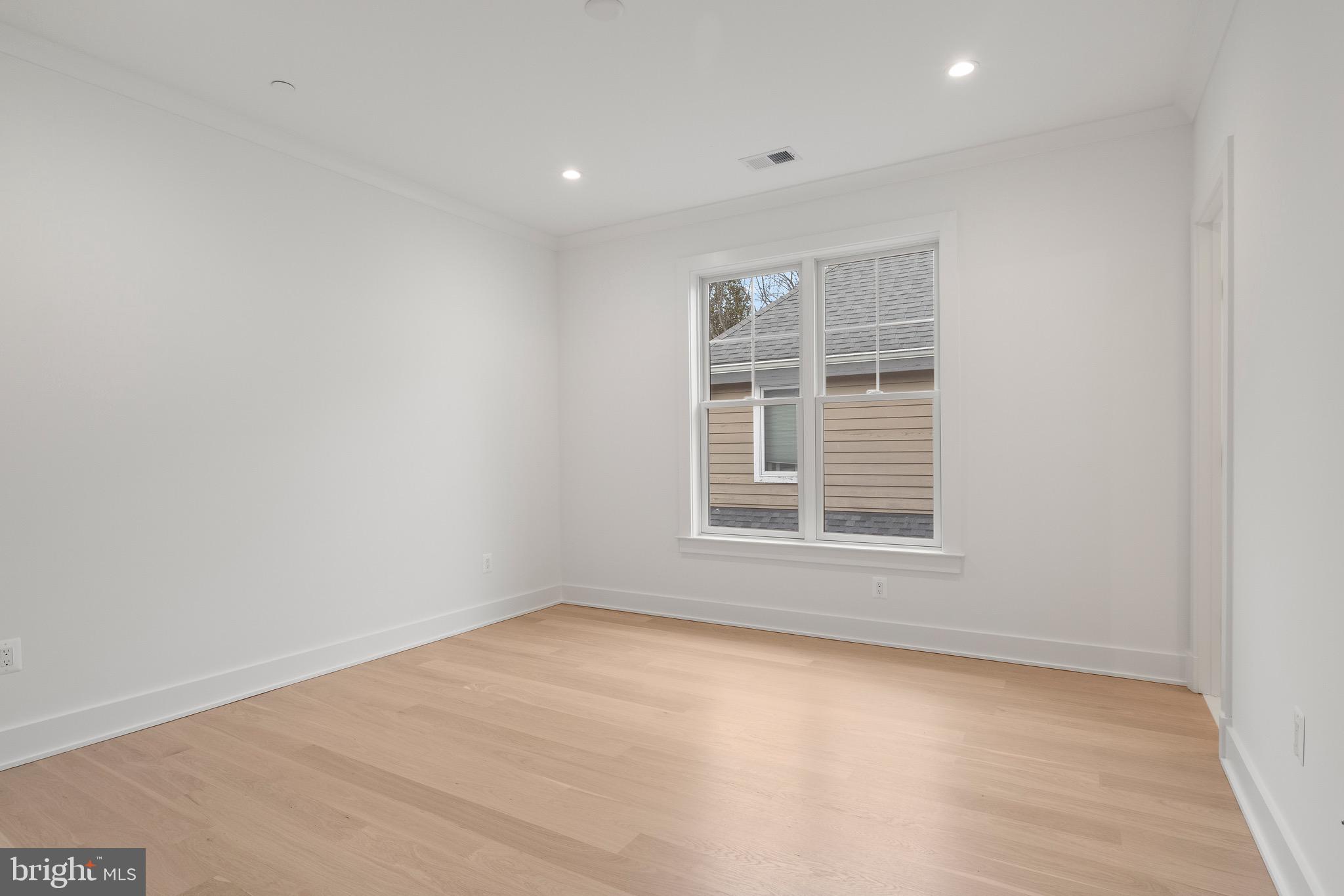 7804 Custer Road Bethesda, MD 20814 - Photo 46 of 68 an empty room with a window