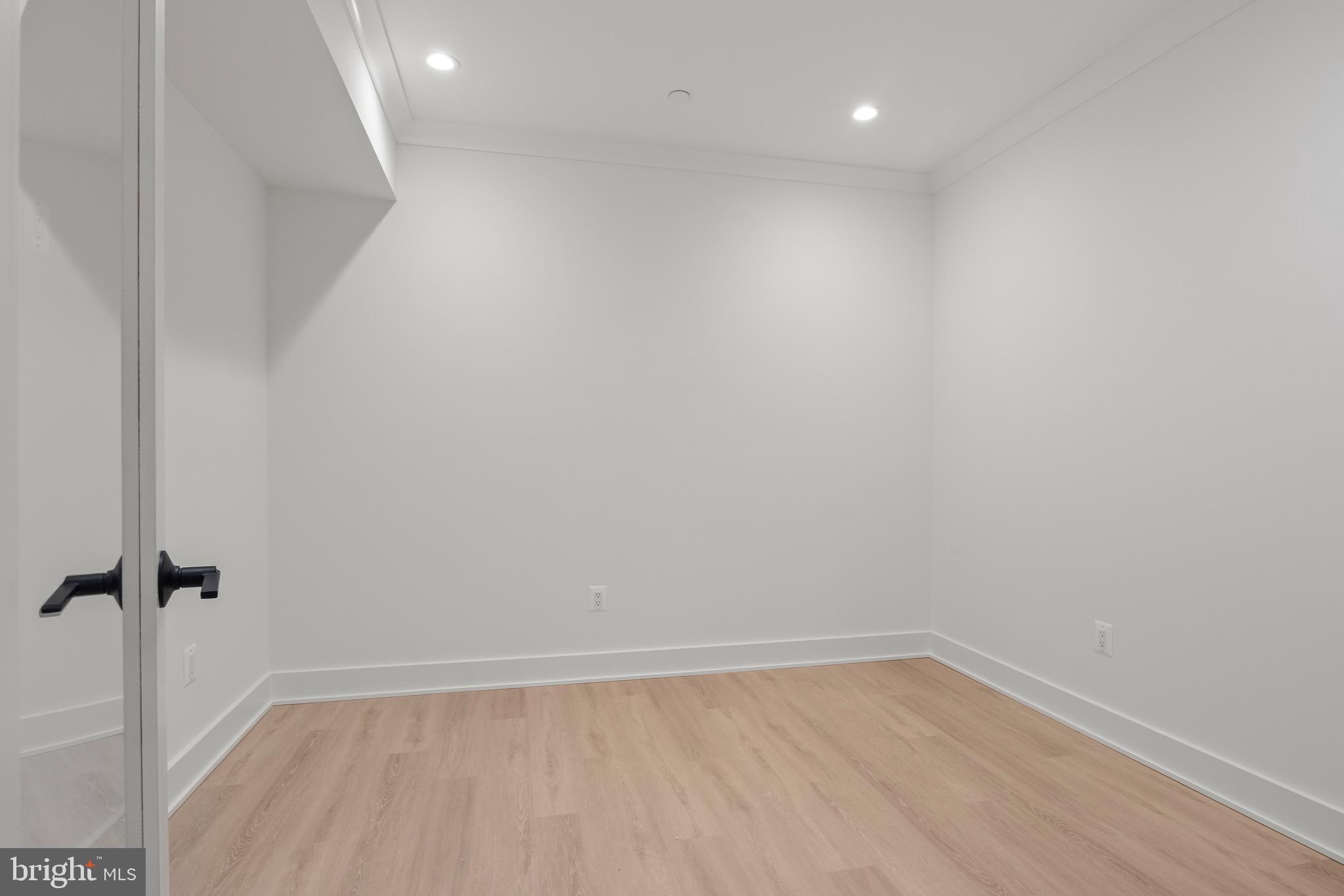 7804 Custer Road Bethesda, MD 20814 - Photo 60 of 68 a view of a room with wooden floor
