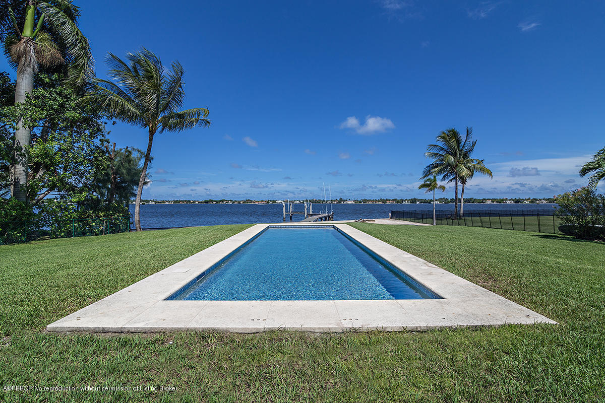 3130 Washington Road West Palm Beach, FL 33405 - Photo 21 of 33 a view of an outdoor space and a swimming pool