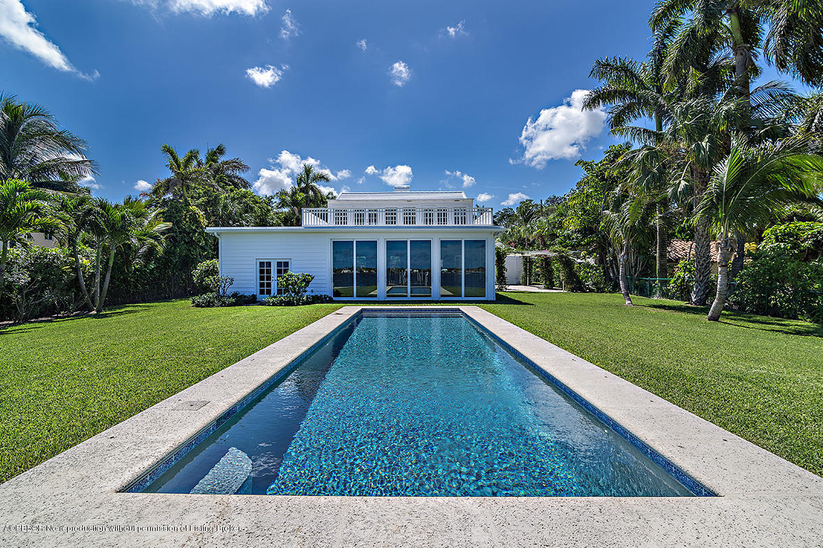 3130 Washington Road West Palm Beach, FL 33405 - Photo 22 of 33 a view of swimming pool with a backyard