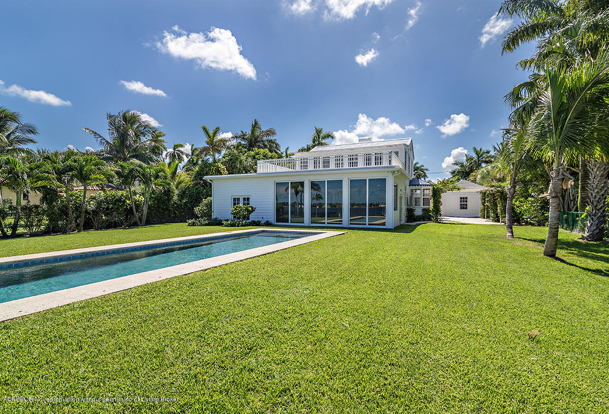 3130 Washington Road West Palm Beach, FL 33405 - Photo 23 of 33 a view of a house with a swimming pool