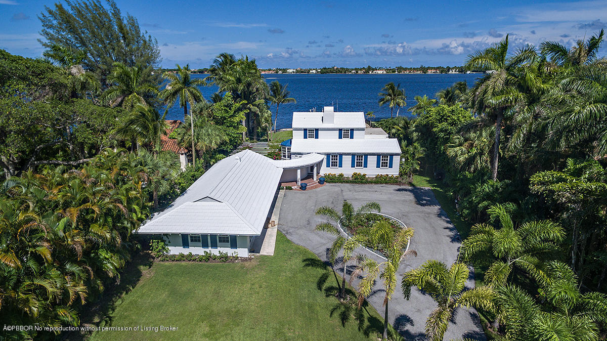 3130 Washington Road West Palm Beach, FL 33405 - Photo 28 of 33 an aerial view of a house with a garden