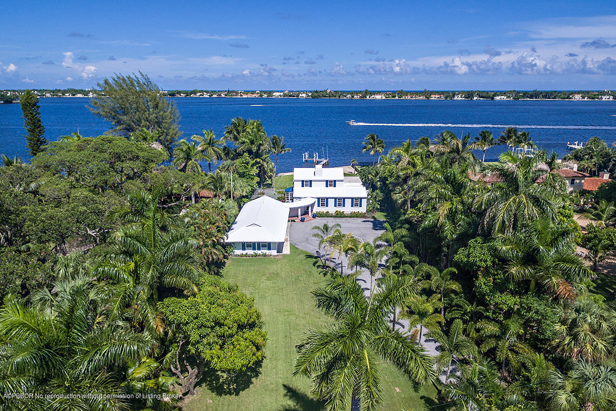 3130 Washington Road West Palm Beach, FL 33405 - Photo 30 of 33 view of a lake with houses in the back