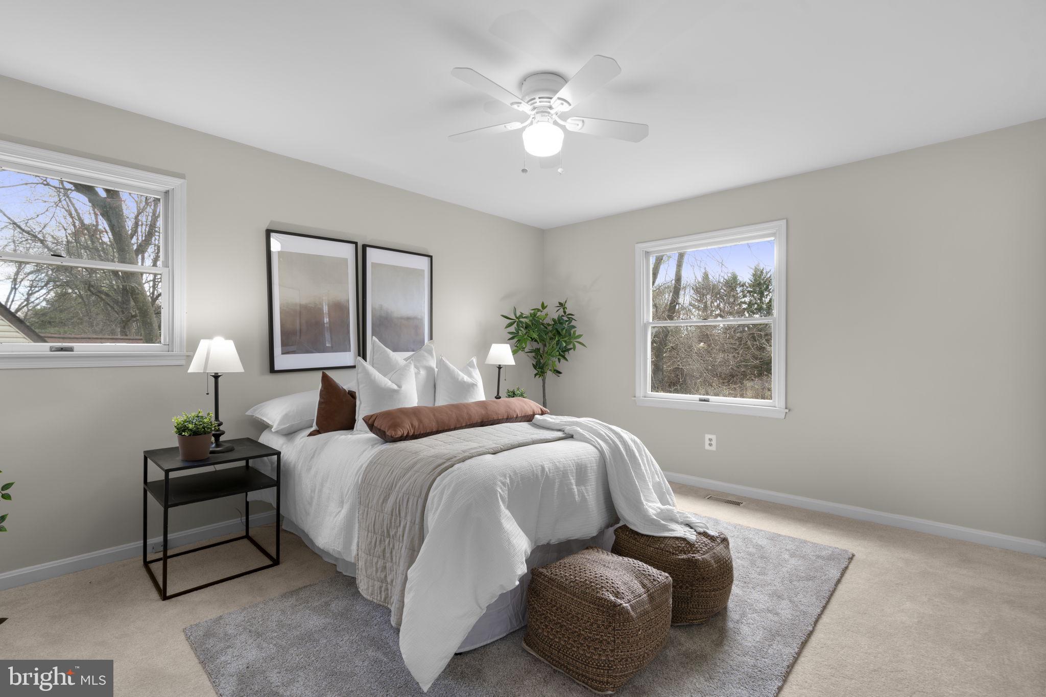 6968 Sunfleck Row Columbia, MD 21045 - Photo 15 of 45 a bedroom with bed and window
