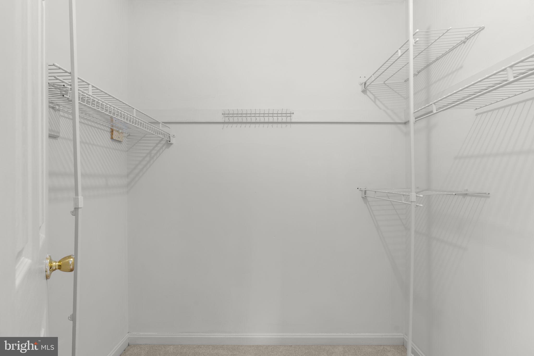 6968 Sunfleck Row Columbia, MD 21045 - Photo 19 of 45 a view of small space with racks on the wall