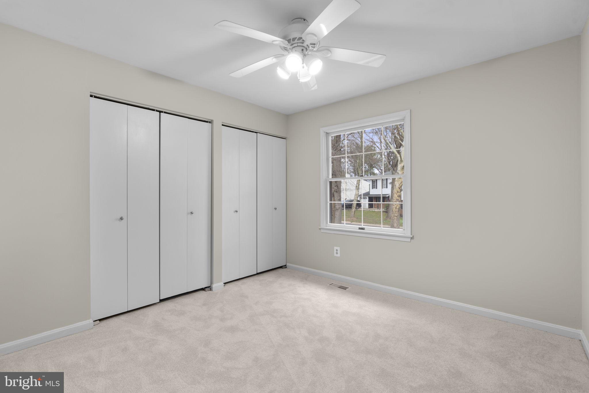 6968 Sunfleck Row Columbia, MD 21045 - Photo 21 of 45 a view of an empty room with a window