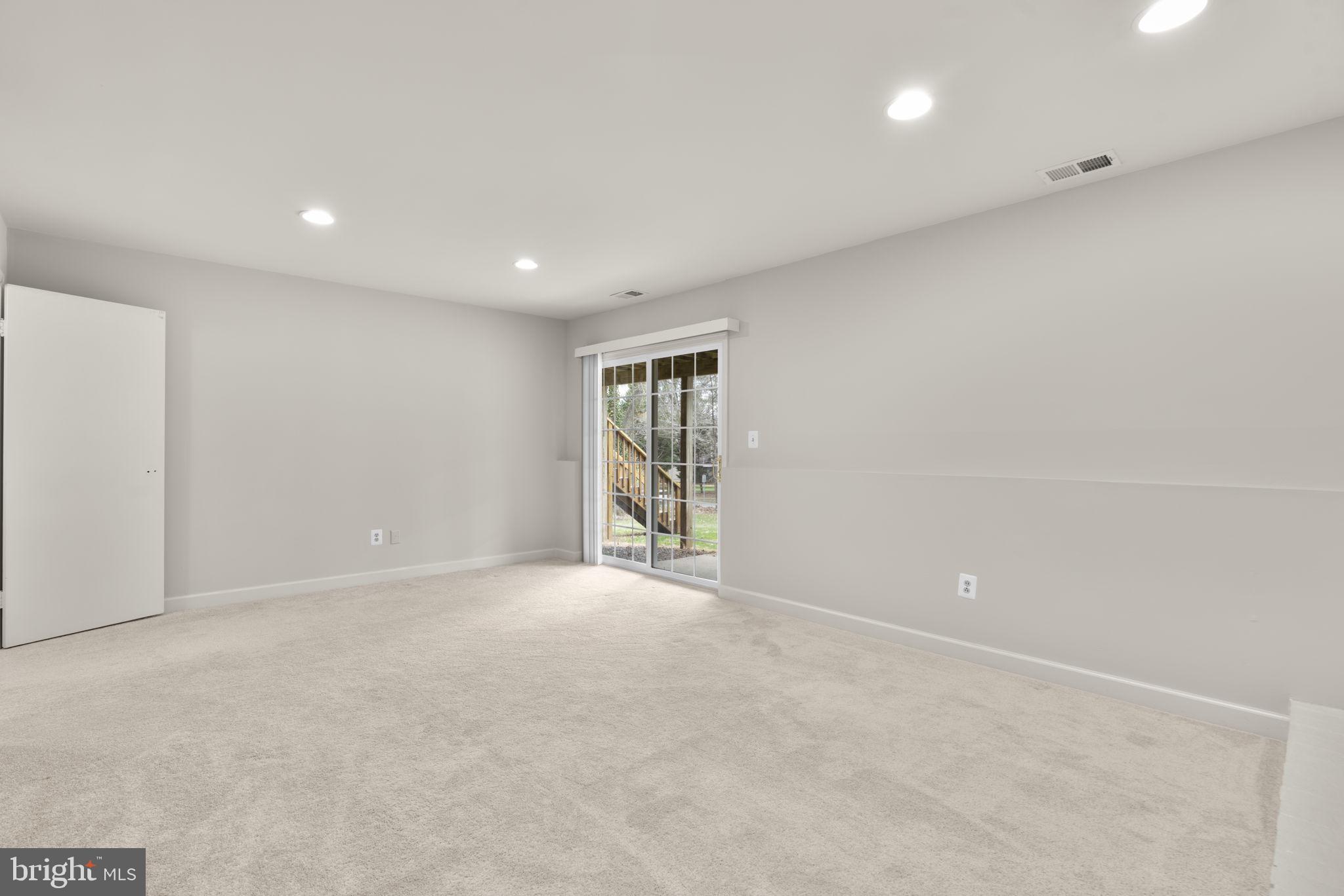 6968 Sunfleck Row Columbia, MD 21045 - Photo 29 of 45 a view of an empty room with a window