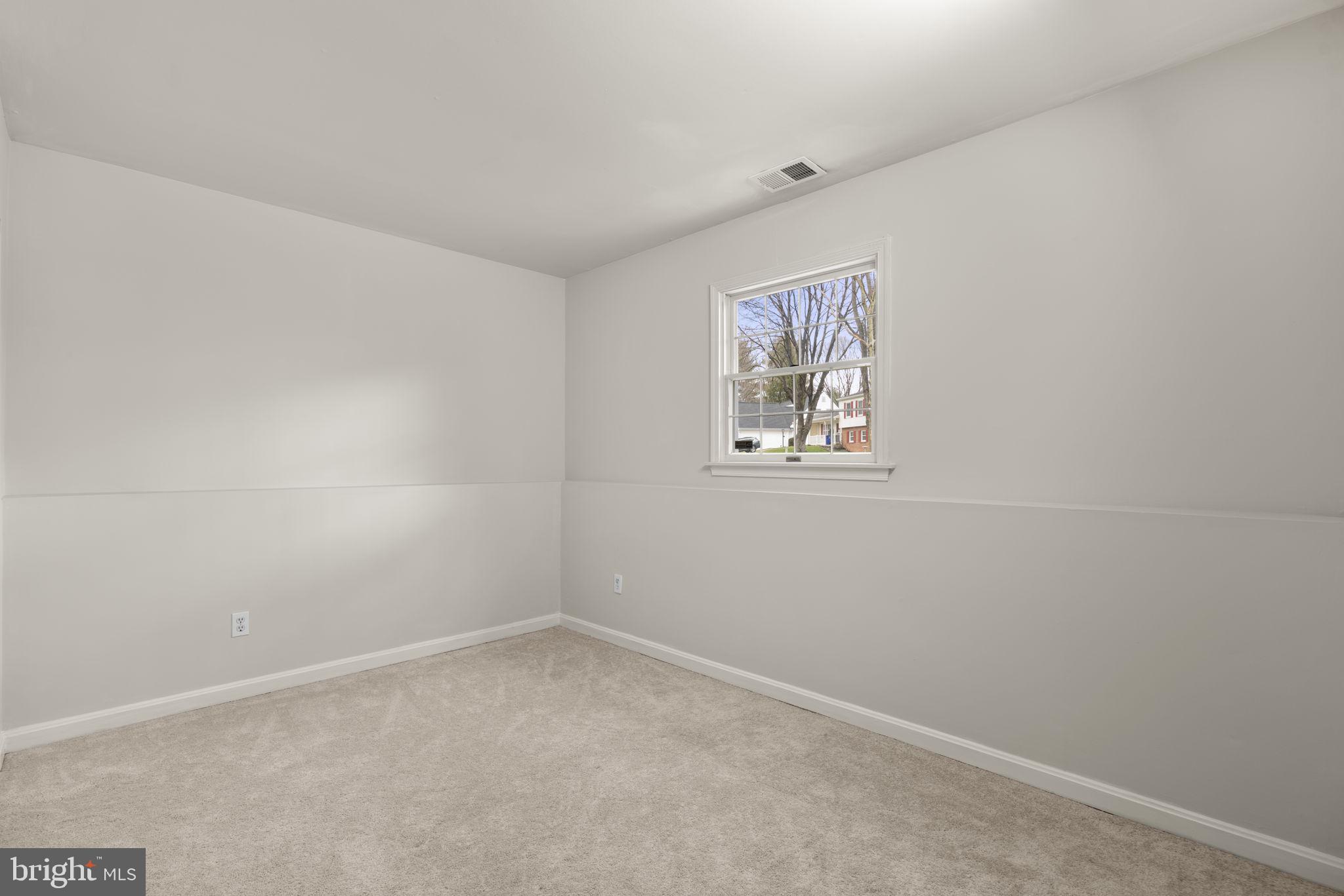 6968 Sunfleck Row Columbia, MD 21045 - Photo 30 of 45 an empty room with a window