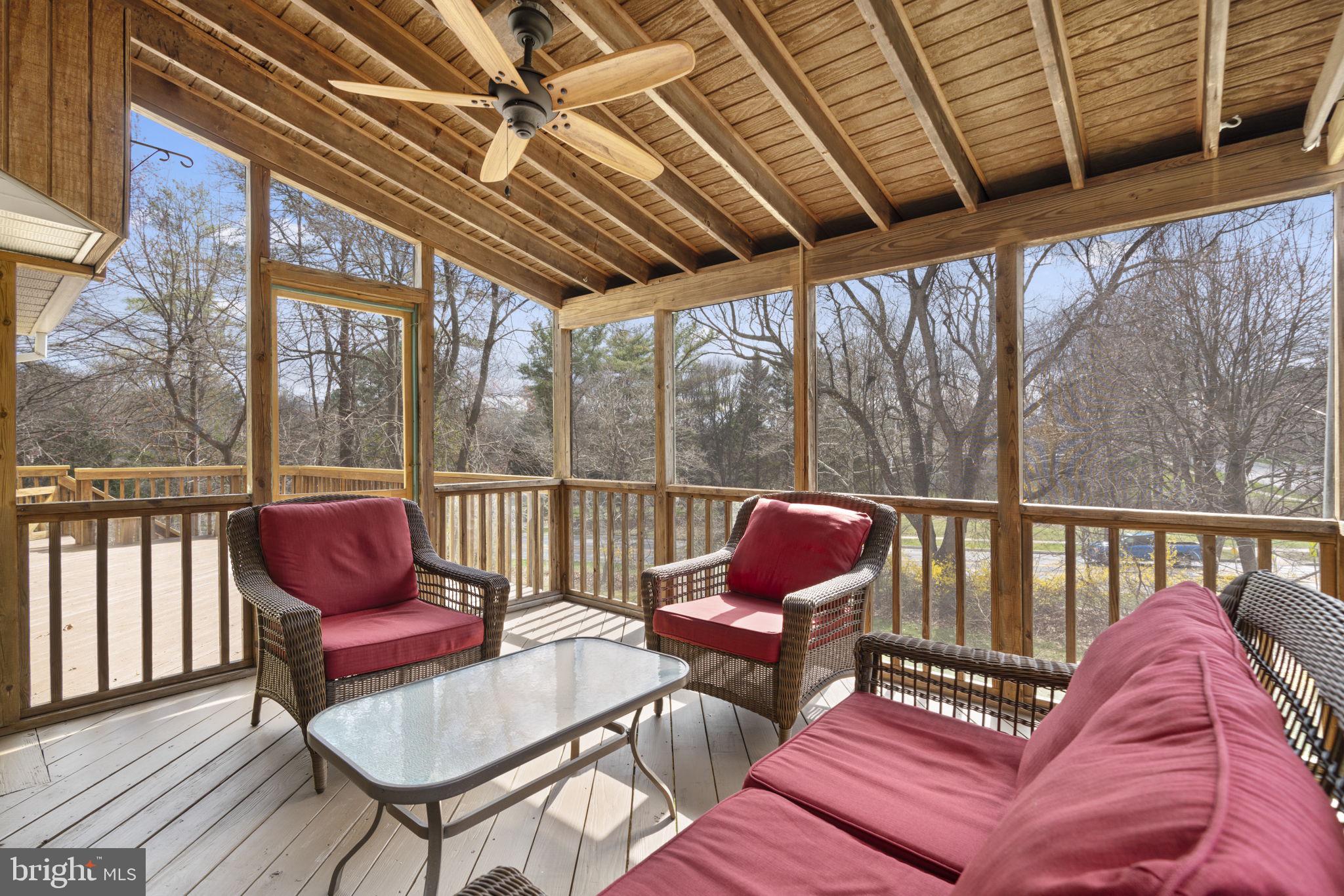 6968 Sunfleck Row Columbia, MD 21045 - Photo 37 of 45 a roof deck with a table and chairs
