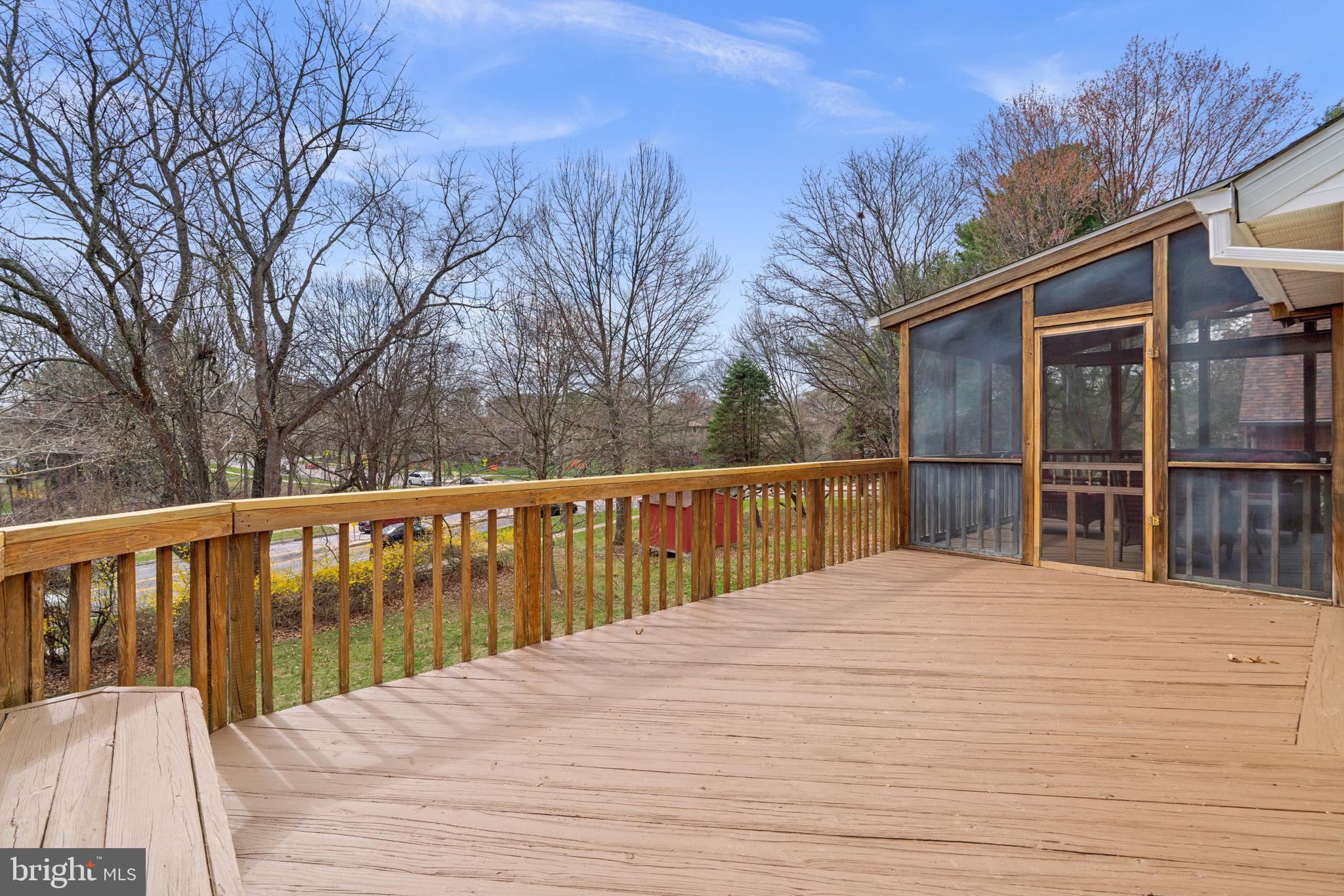 6968 Sunfleck Row Columbia, MD 21045 - Photo 38 of 45 a view of wooden deck and a backyard