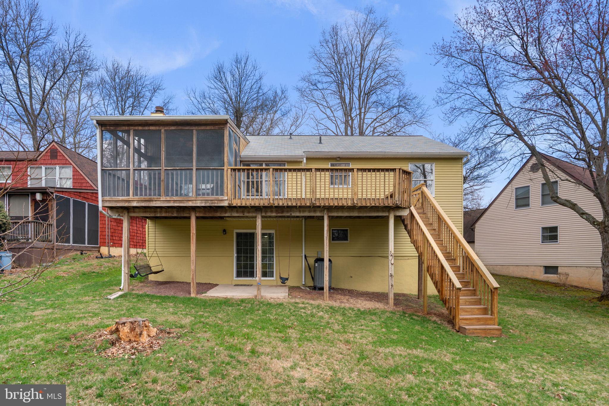 6968 Sunfleck Row Columbia, MD 21045 - Photo 41 of 45 front view of a house with a yard