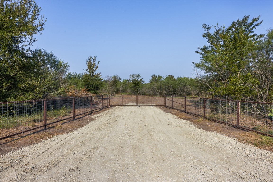 1644 Calvert Tx 77837 Calvert, TX 77837 - Photo 17 of 17 View of dirt / gravel road with a gate