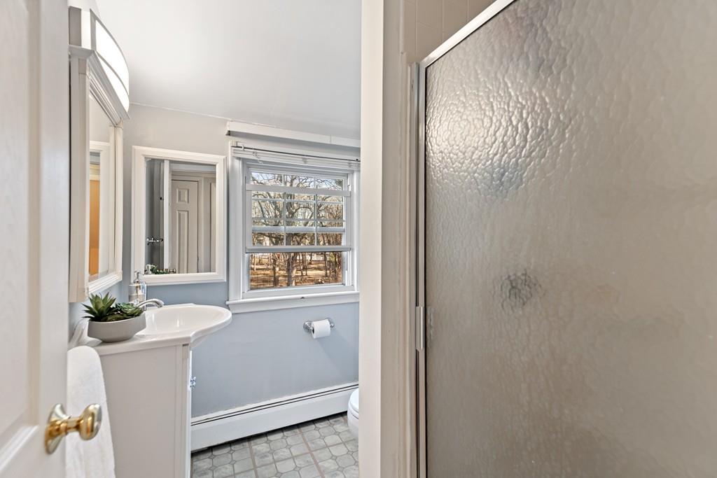 294 Salem Road Billerica, MA 01821 - Photo 21 of 25 a bathroom with a bathtub and shower
