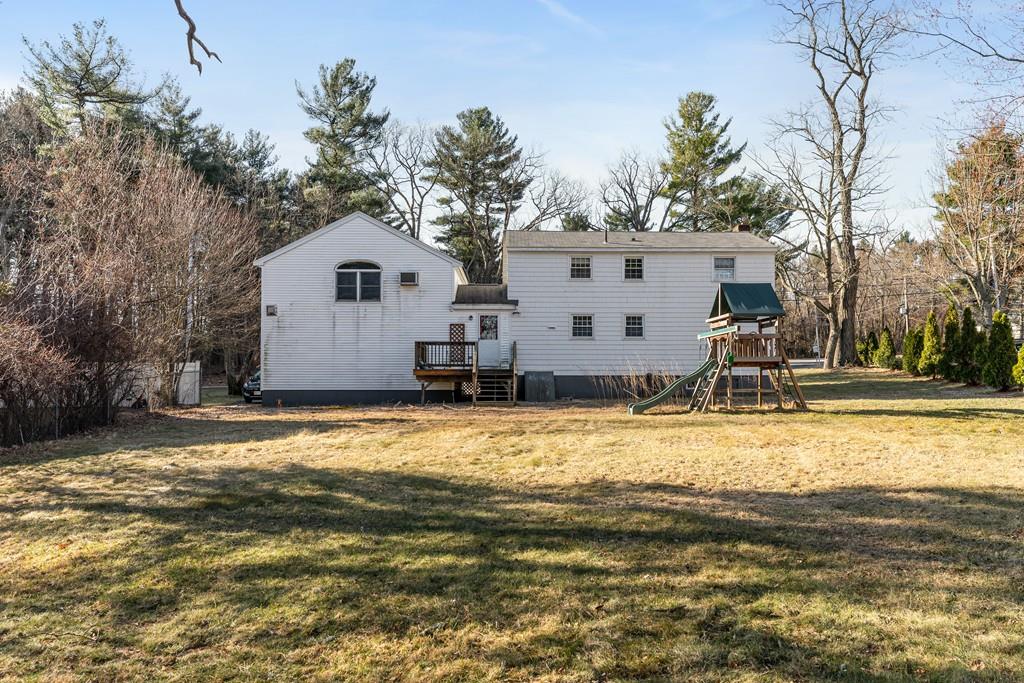 294 Salem Road Billerica, MA 01821 - Photo 25 of 25 a view of a house with a swimming pool with a patio