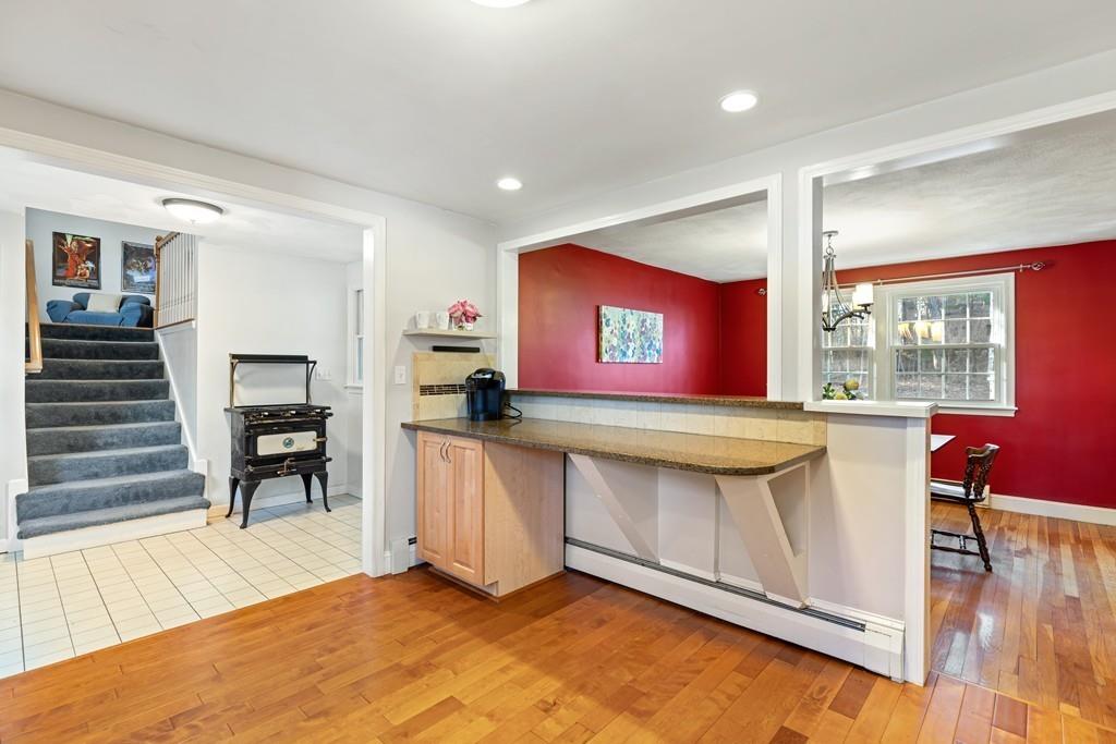 294 Salem Road Billerica, MA 01821 - Photo 8 of 25 a view of kitchen with microwave and furniture