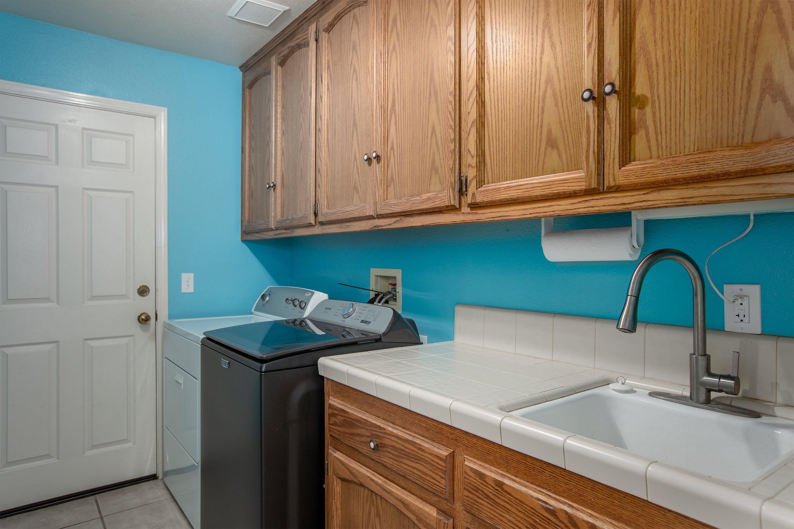 3376 Shepherd Drive Lompoc, CA 93436 - Photo 20 of 27 a kitchen with a sink and cabinets