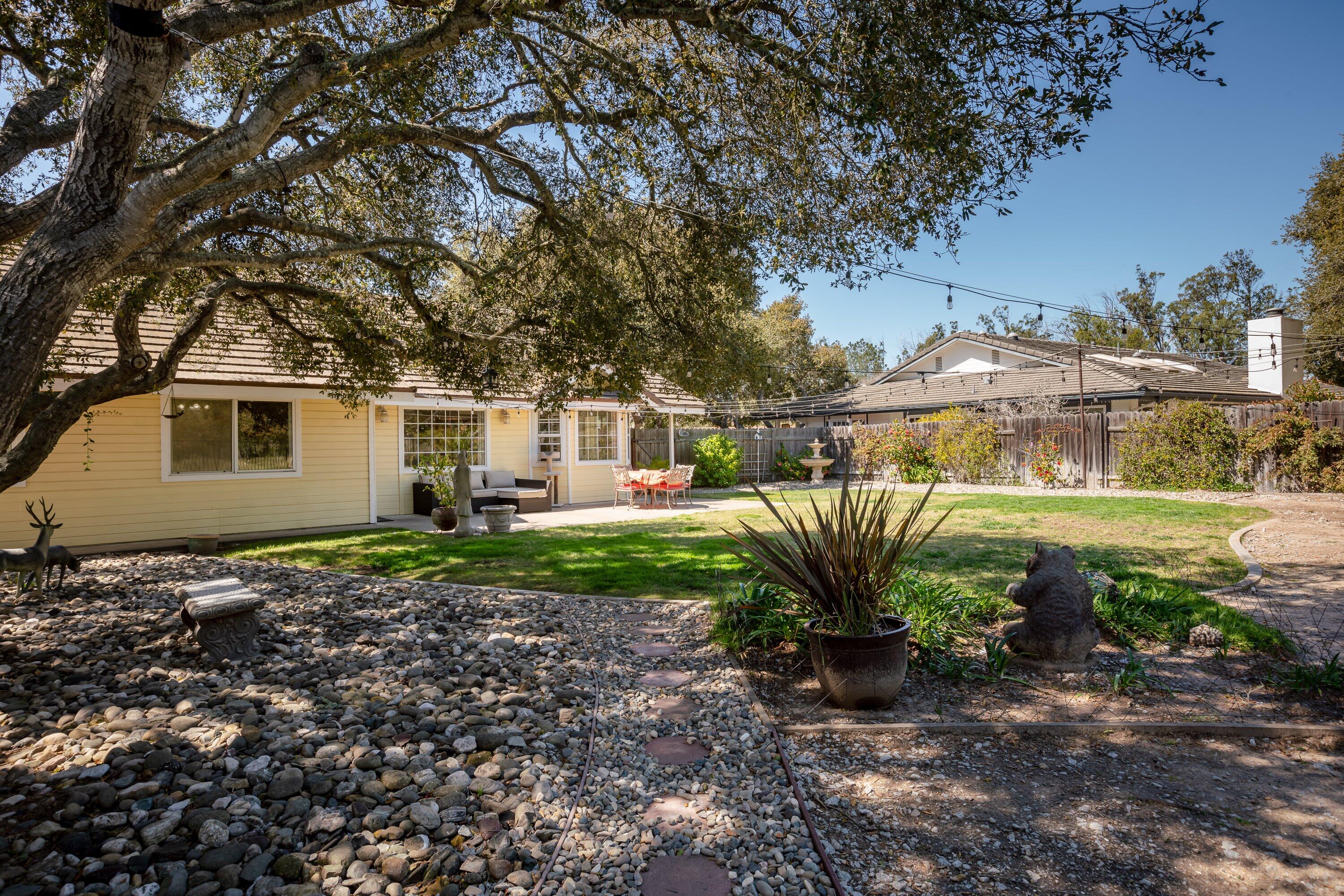 3376 Shepherd Drive Lompoc, CA 93436 - Photo 25 of 27 a view of a house with backyard sitting area and garden