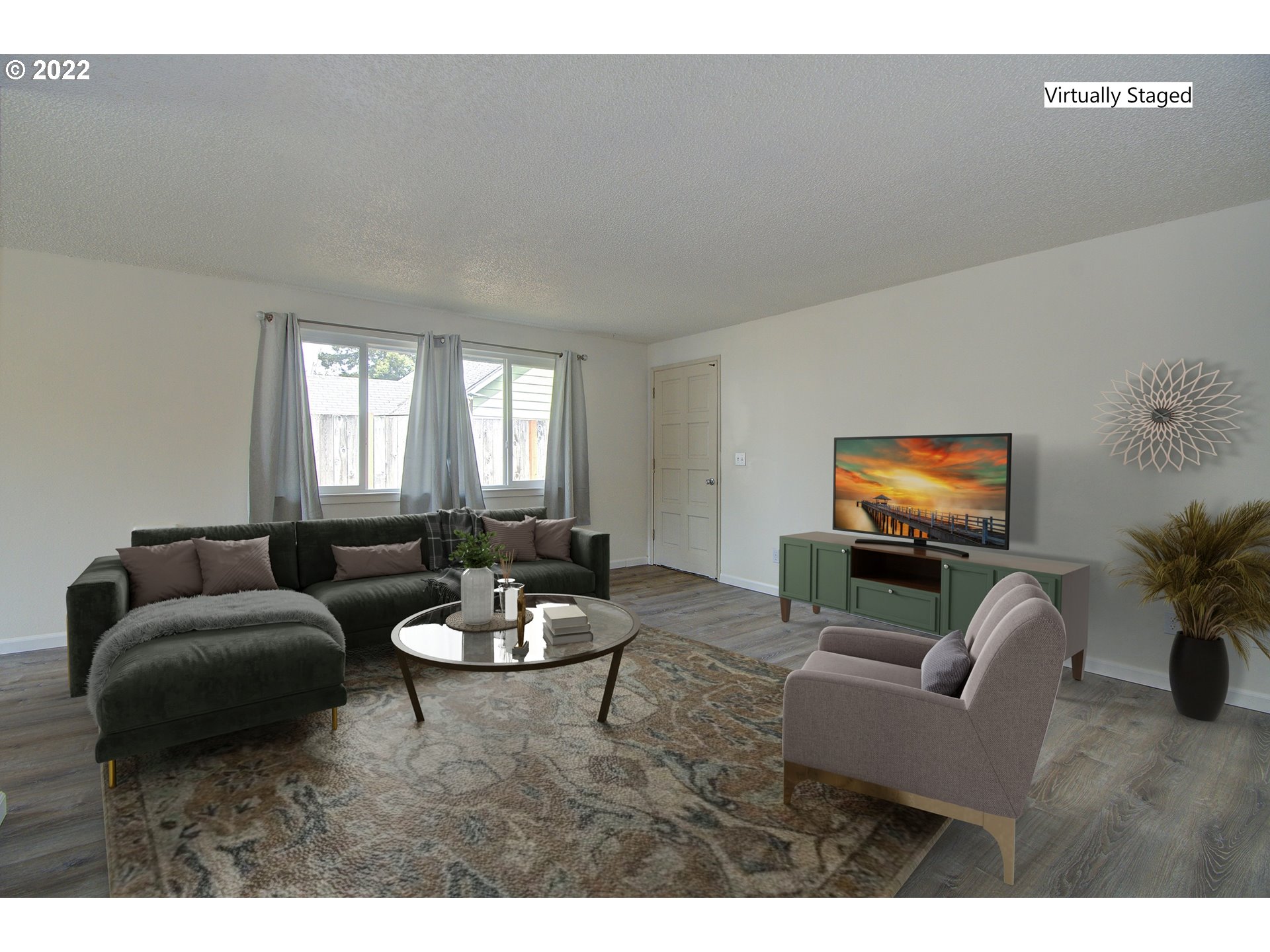 2912 R Street Vancouver, WA 98663 - Photo 6 of 24 a living room with furniture and a flat screen tv