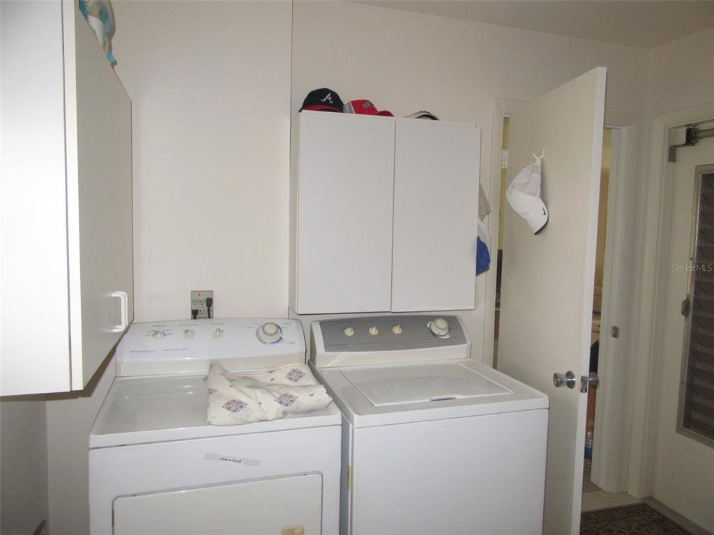 8158 Fay Avenue North Port, FL 34287 - Photo 18 of 23 a utility room with dryer and washer