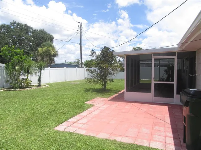 a view of a backyard with a garden