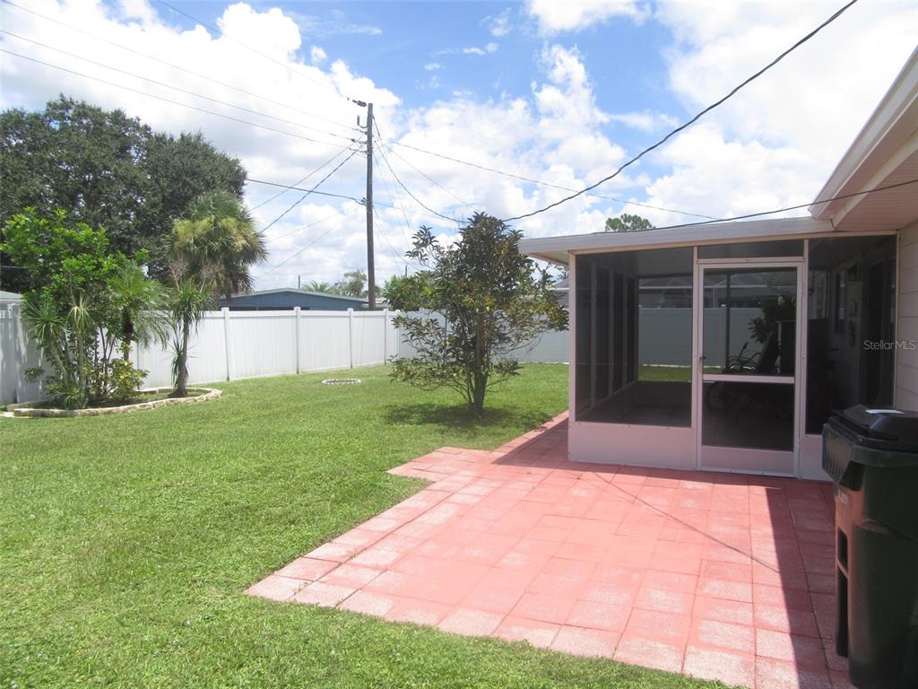 8158 Fay Avenue North Port, FL 34287 - Photo 23 of 23 a view of a backyard with a garden