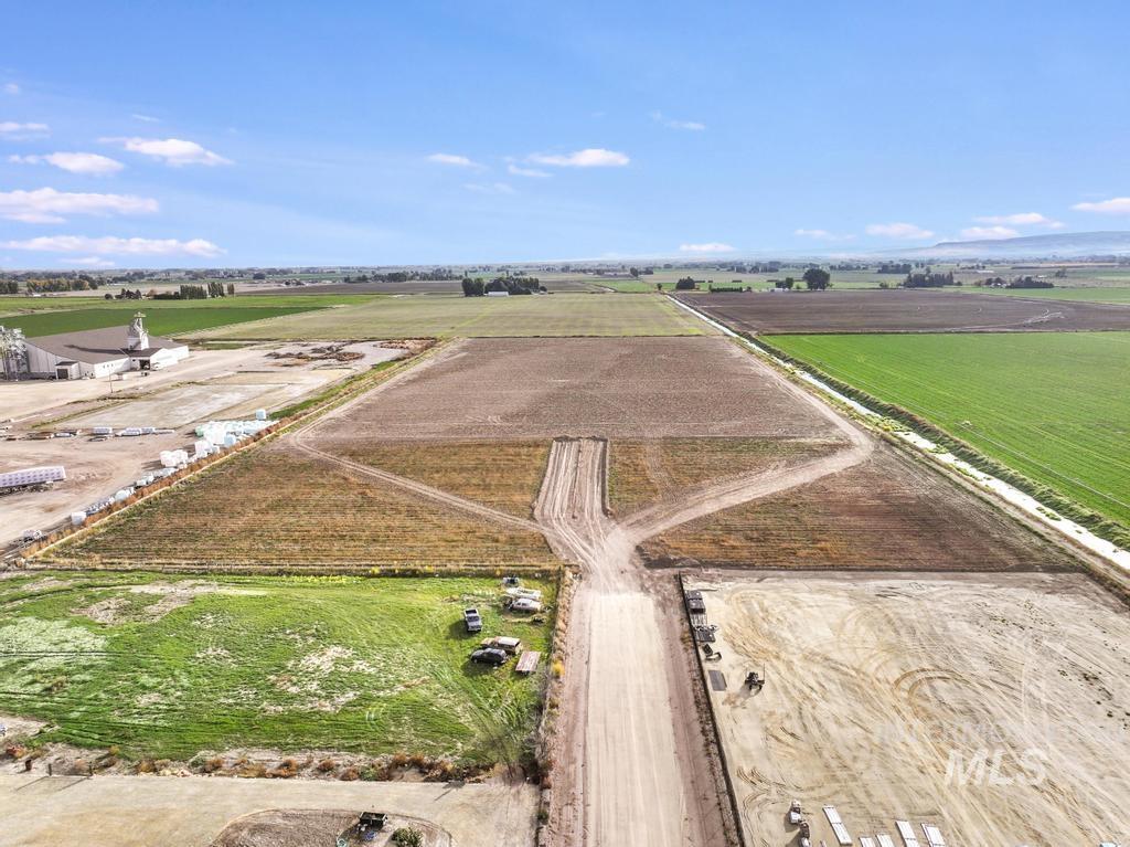 200 South 200 West Rupert, ID 83350 - Photo 14 of 25 Aerial view of property and surrounding area with rural landscape and abundant farmland
