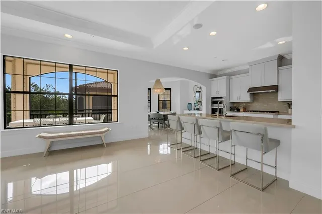 a kitchen with counter top space cabinets and stainless steel appliances