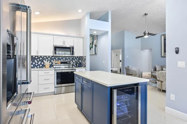 a view of a backyard with sitting area