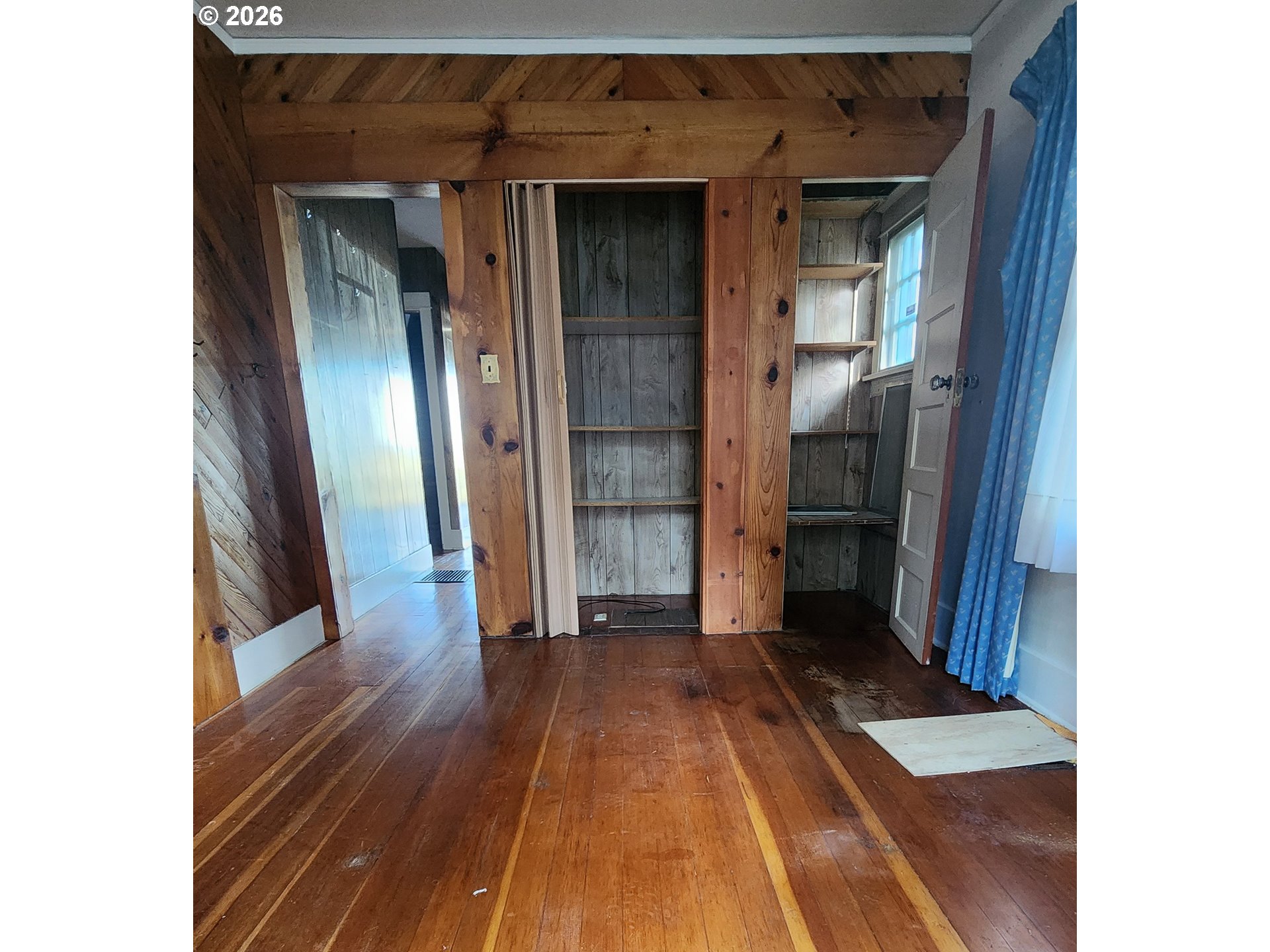 2605 Northeast Jarrett Street Portland, OR 97211 - Photo 10 of 23 a view of a hallway with wooden floor and staircase