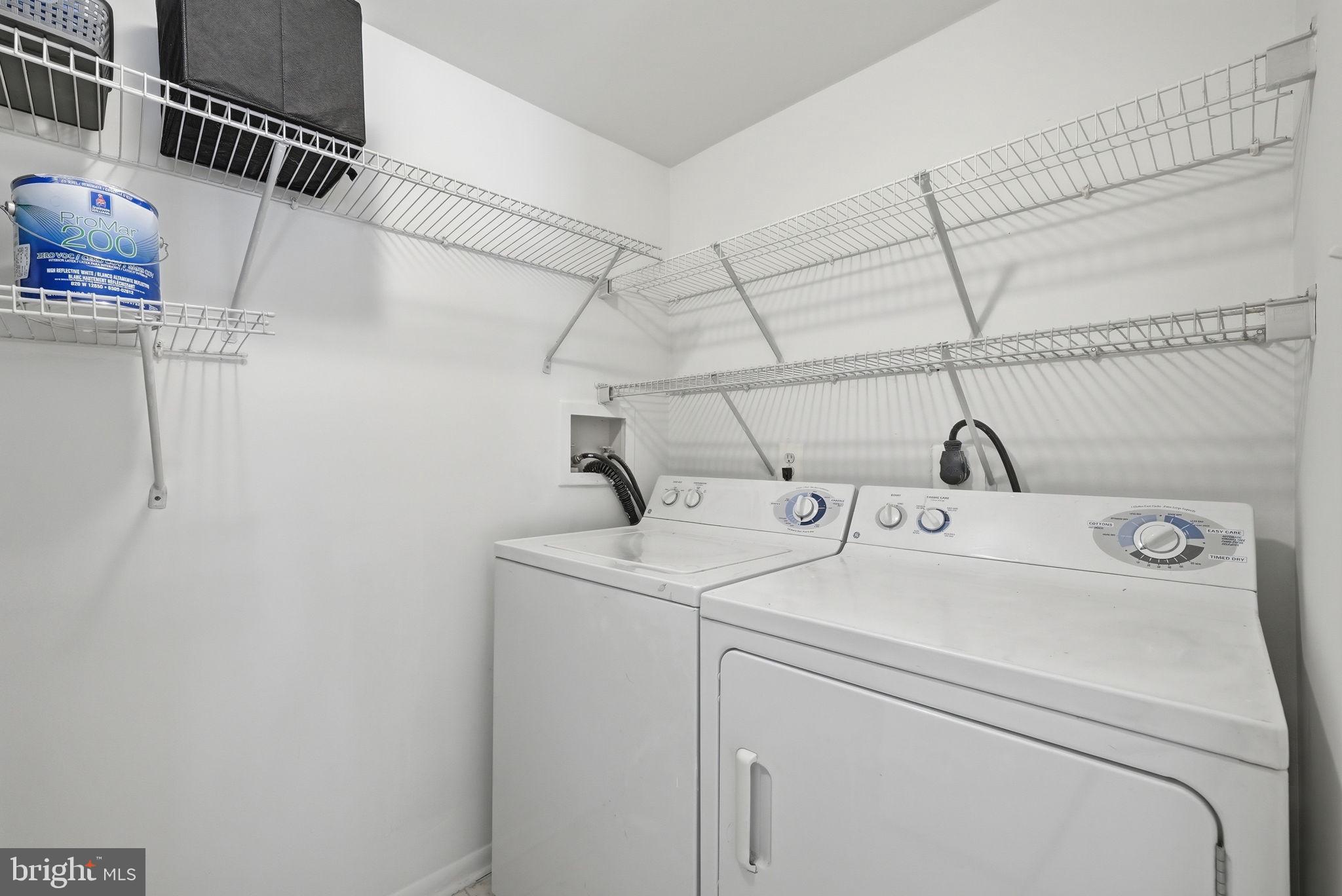 1703 Ascot Way, Unit D Reston, VA 20190 - Photo 20 of 21 a utility room with dryer and washer